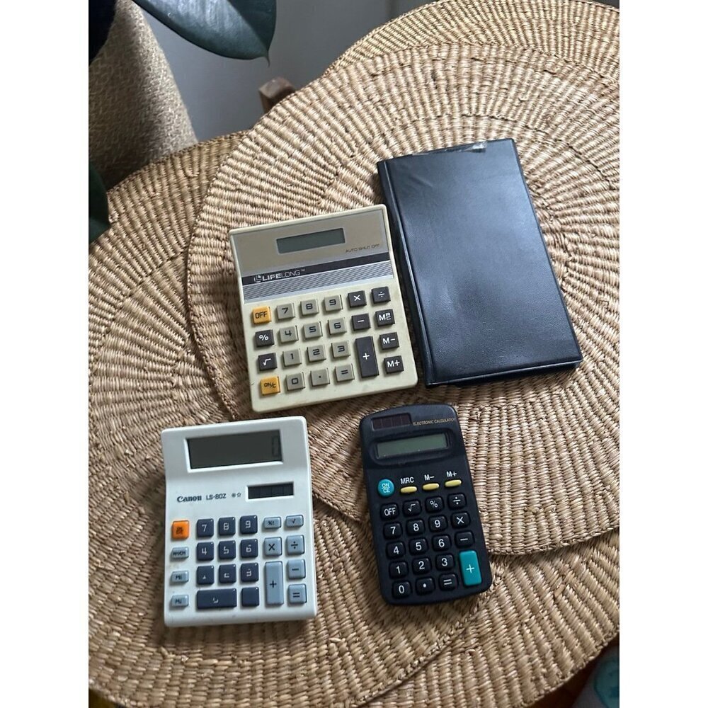 4 vintage Calculators